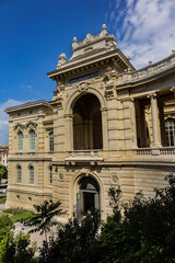 Picturesque view of Longchamp Palace (1869) with a cascading fountain and beautiful surrounding park. MARSEILLE, FRANCE.