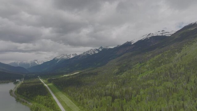 Following the tree filled mountainside in Jasper National Park