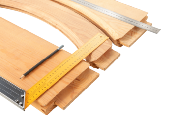 transverse wooden blanks for the assembly of paneled doors, processed by a milling machine in a carpentry workshop, on an isolated background