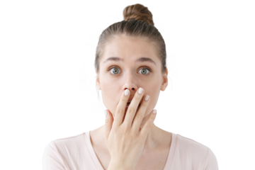 Scared girl covering mouth with hand in sign of deep amazement and shock