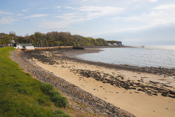Sunny day along the shoreline of the Fife Coastal Path at Black Sands Beach on the Firth of Forth...