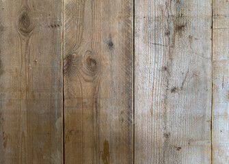 Obraz premium Texture of old wooden shabby planks with cracks and stains. Abstract background