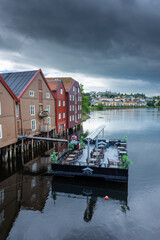 Fototapeta premium Beautiful view of the colorful wooden buildings of Trondheim Canal, Norway