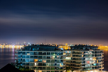 Dramatic night with many clouds in the city of Posadas, Argentina. Long exposure night photography.