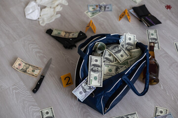 Handcuffs on many stacks of dollar bills. Metal suitcase with money, concept of arrest, investigation and fraud.