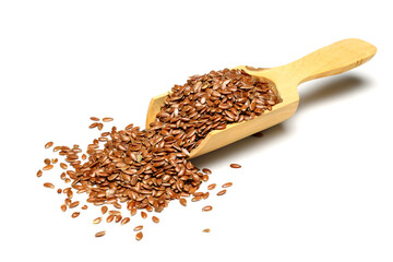 Vegetarian organic nutrition flax seeds in scoop on white background