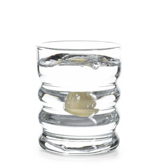 Glass of water with soluble tablet isolated on white background