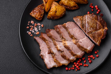 Delicious juicy pork or beef steak grilled with salt, spices and herbs