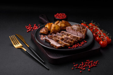 Delicious juicy pork or beef steak grilled with salt, spices and herbs