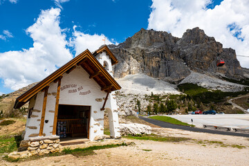 Mount Lagazuoi and the church on Falzarego pass (on the facade of the church the latin writes says "My soul magnifies the Lord")