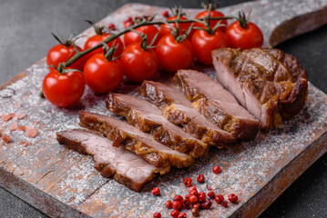 Delicious juicy pork or beef steak grilled with salt, spices and herbs