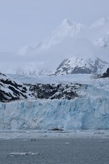 Glacier and snow capped mountain in Alaska
