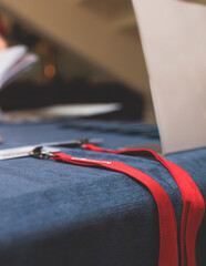 Registration desk table, process of checking in on a conference congress forum event, visitors and...