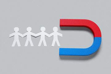 Magnet attracting group of employees on white background. Recruitment concept