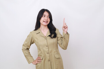 Happy government worker showing something with her finger