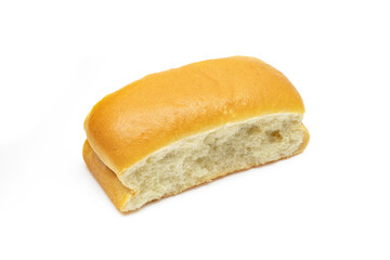 Single soft milky bun. Brioche golden pastry isolated on white background