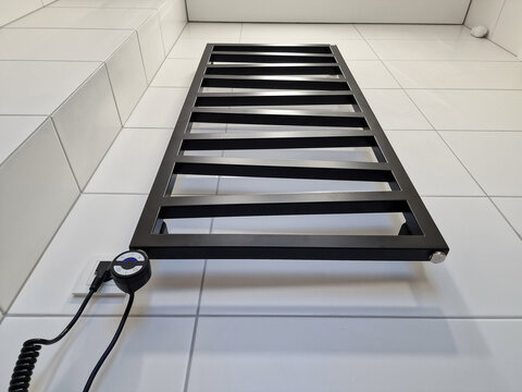Stylish black electric towel dryer