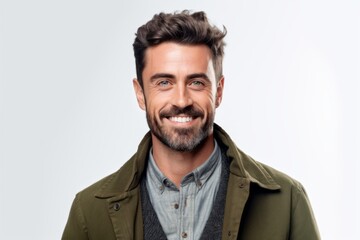 Obraz premium Portrait of a handsome young man smiling at camera isolated on a white background
