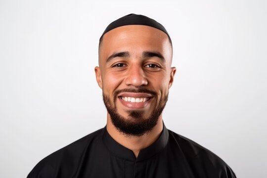 Portrait of a happy muslim man isolated on a white background