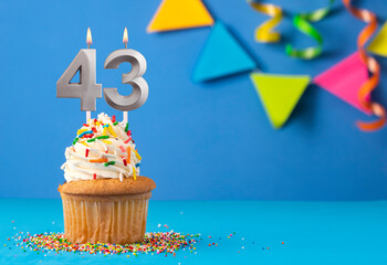 Candle number 43 - Cake birthday in blue background