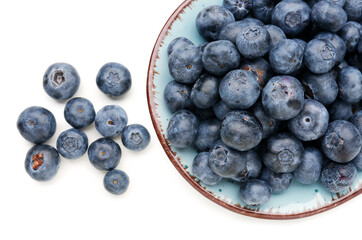Plate with ripe blueberry on white background, closeup