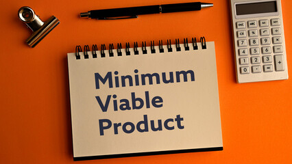There is notebook with the word Minimum Viable Product. It is as an eye-catching image.