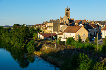 Fototapeta na wymiar Scenic view of ancient church and houses of Dormans commune at summer day, France