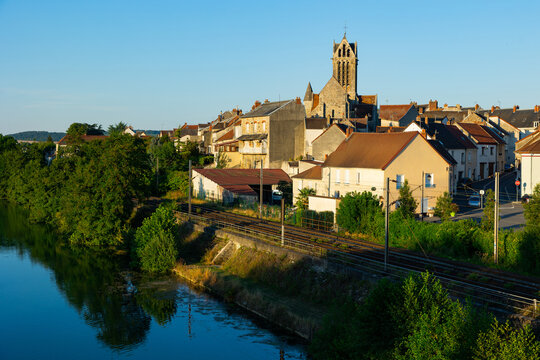Scenic view of ancient church and houses of Dormans commune at summer day, France