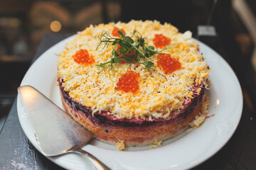 Catering table, beautifully decorated banquet with variety of with different food snacks appetizers on corporate birthday party event or wedding celebration, canape, salad, delicatessen setting