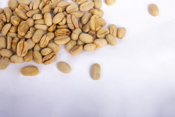 green coffee bean isolated on white background - coffee bean negative space