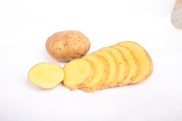 young potatoes cut in half and isolated on a white background