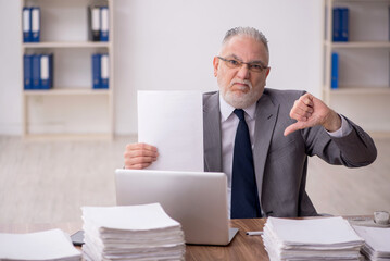 Old male employee and too much work at workplace