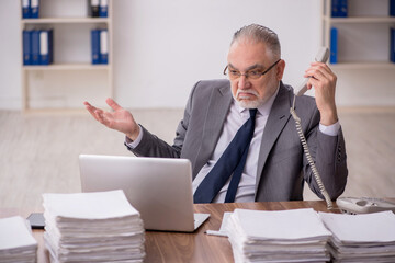 Old male employee and too much work at workplace