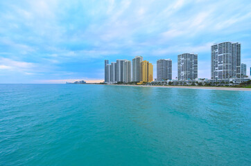 View of Sunny Isles Beach from the pier during cloudy winter eveninf (Florida, USA)