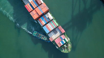 Fototapeta premium Aerial view container cargo ship, Global business import export logistic and transportation freight shipping of international by container cargo ship, Container cargo vessel freight shipping.