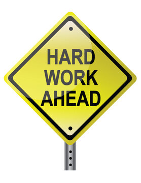 Hard work ahead street sign. Vector file also available. / Hard Work Ahead