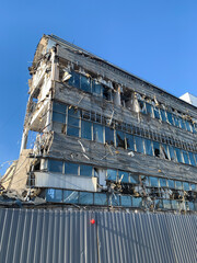 dismantling of an office building made of glass and concrete