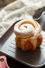 Homemade mini pastry buns on a plate