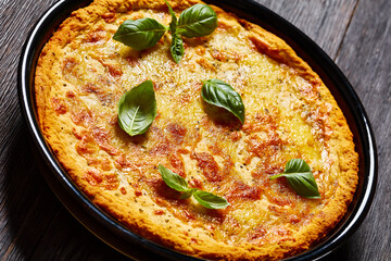 upside down pizza in baking dish, top view