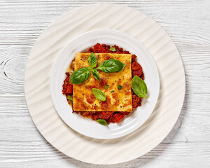 portion of upside down pizza on white plate