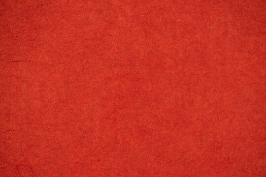 Old and texture red mulberry paper background.