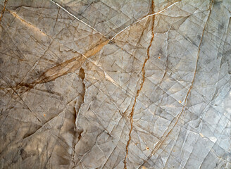 Closeup of a Marble Rock Wall with Cracks.