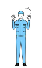 驚いて手を上げる帽子と作業着姿のシニア男性（経営者、管理職、上司）