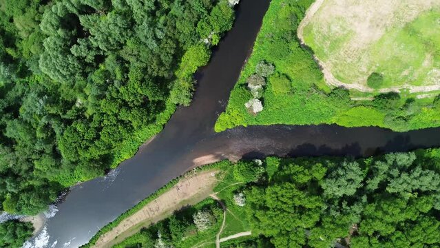 River aerial view circular motion of Y character showing split detaur dilemma