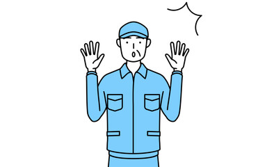 驚いて手を上げる帽子と作業着姿のシニア男性（経営者、管理職、上司）