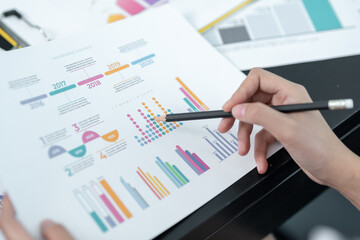 Fototapeta premium businesswoman hands working on paperwork table
