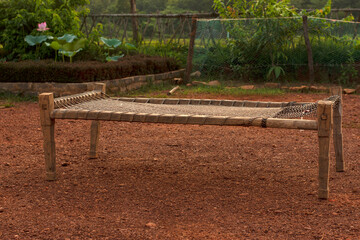 Charpai or Khatia (easy portable cots made with ropes) is a traditional woven bed used throughout South Asia.