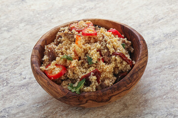 Arabic cous cous with meat and tomato