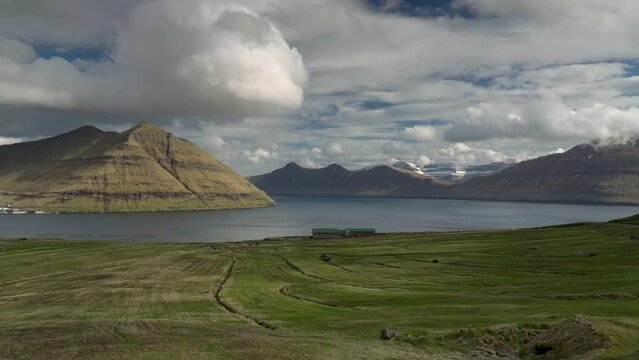 Scenic Mountains And Clouds Near Fuglafjordur Village In Eysturoy, Faroe Islands, Denmark. Timelapse