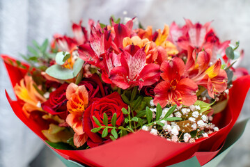 Festive bouquet of red irises close-up